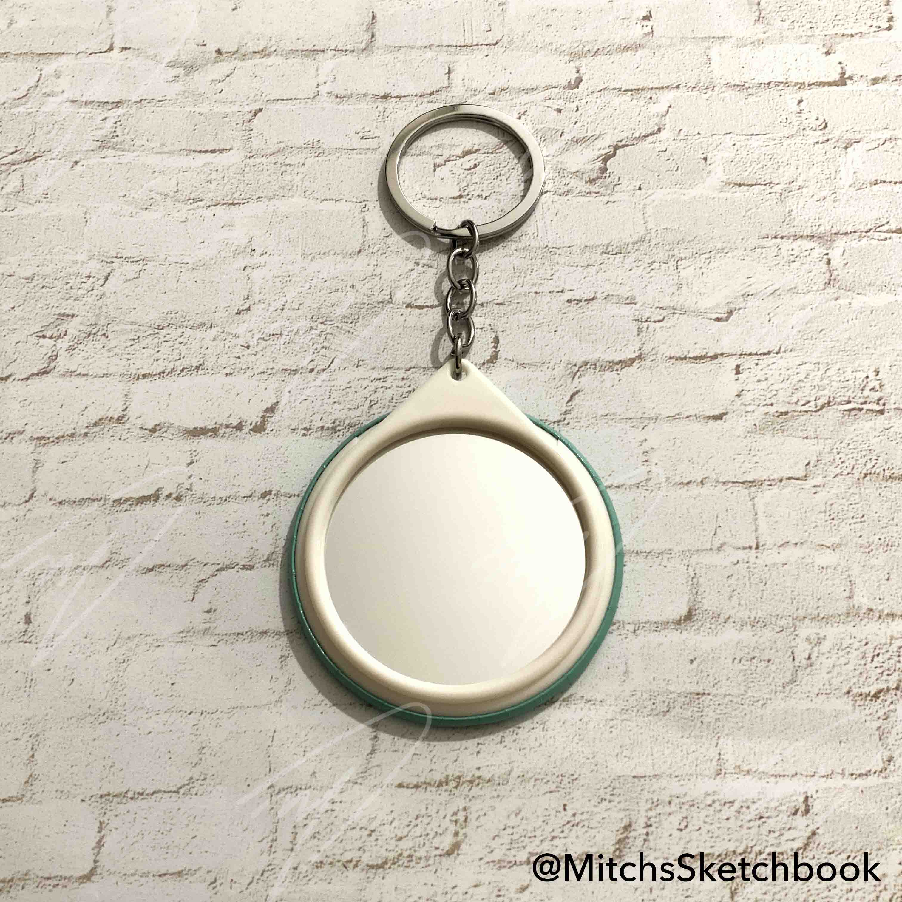 X-ion Mirror Keychain